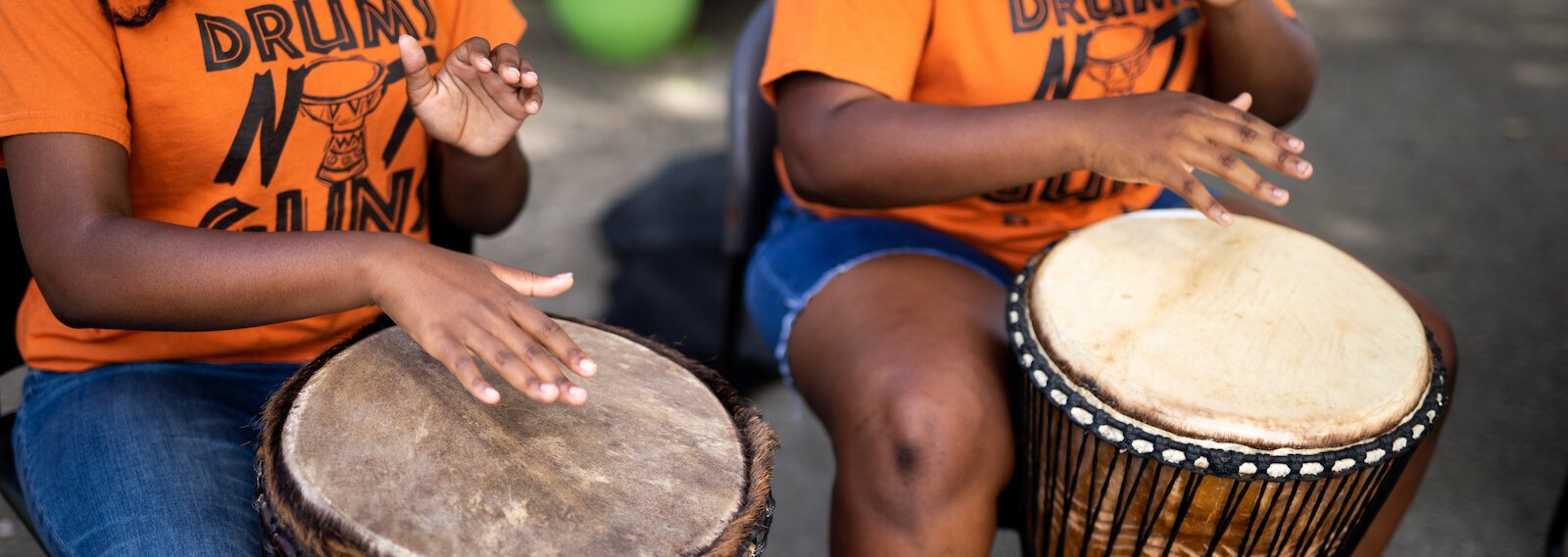 Members of the Omotayo Rite of Passage "Drums Not Guns" program perform a song in Southeast Fort Wayne.