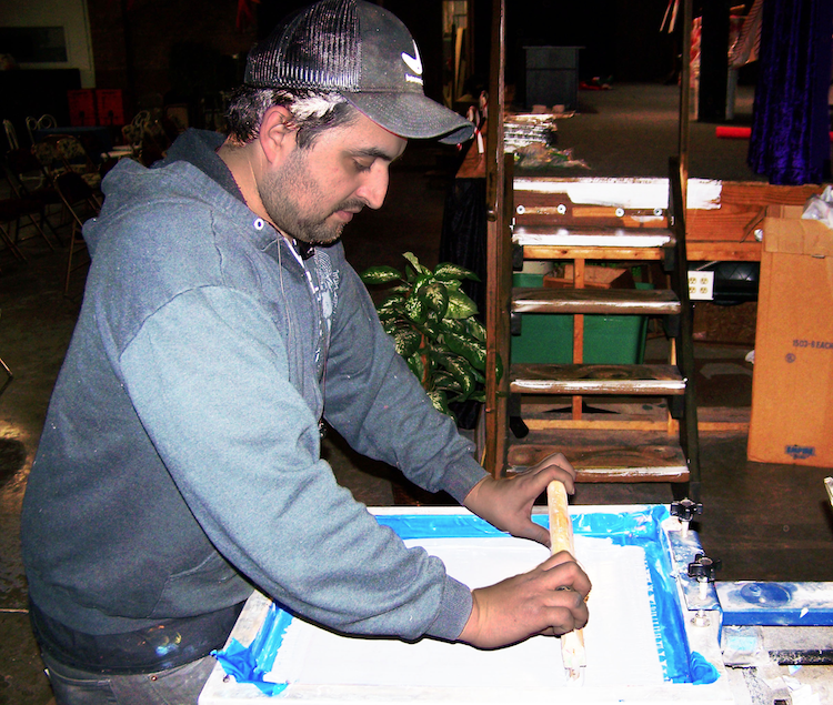 Paco Reyes, who wanted to do screen printing since he was 13, prints and sells t-shirts and teaches others the art of screen printing at TekVenture.