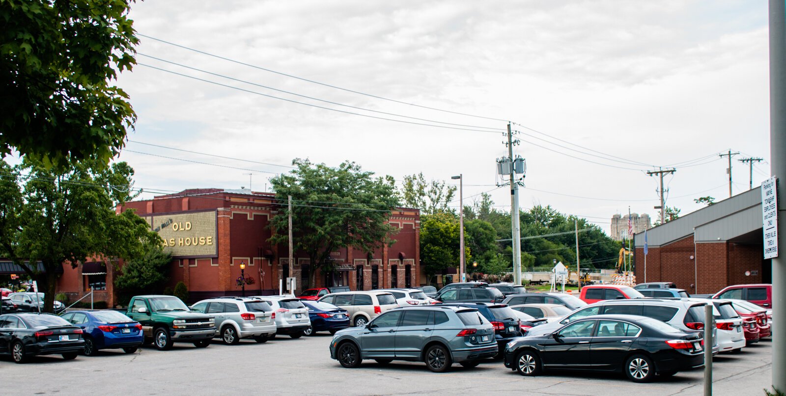 Surface parking lots, like the one at Hall's Gas House, are often popular with guests, but come at a cost to density Downtown.