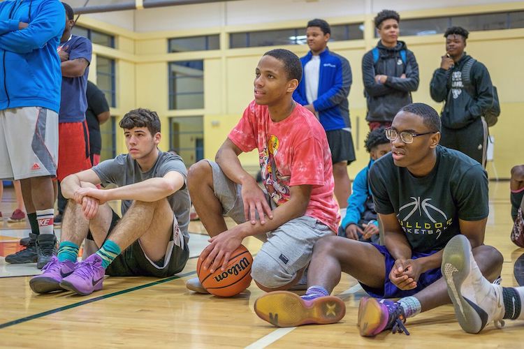 Participants of the Fort Wayne United Late Night Basketball Program prepare to play.