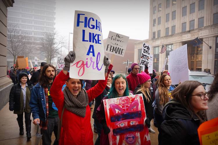 Demonstrators take to the streets of downtown Fort Wayne as part of the Women's March.