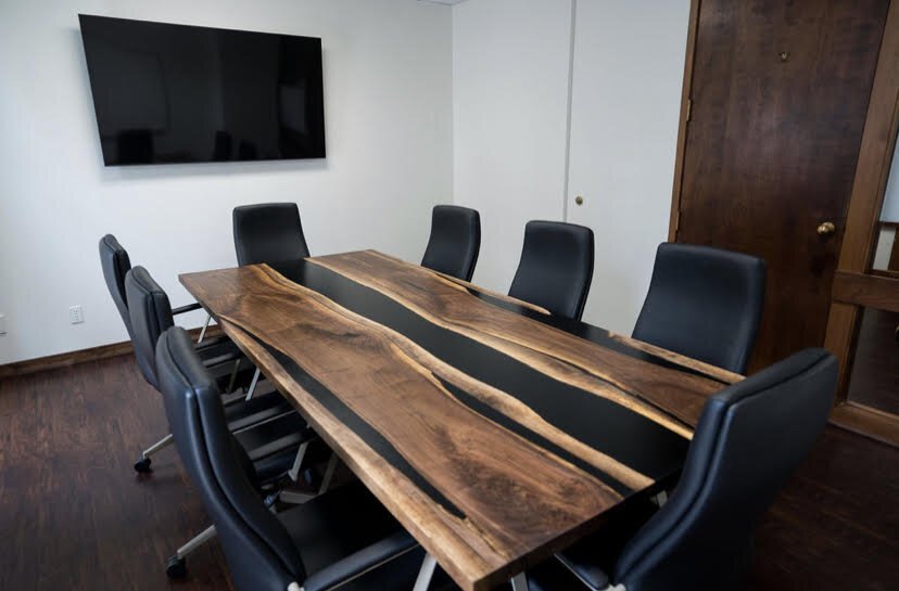 A conference table by Fort Wayne Industrial Revolution for Podlaski Law, LLC.