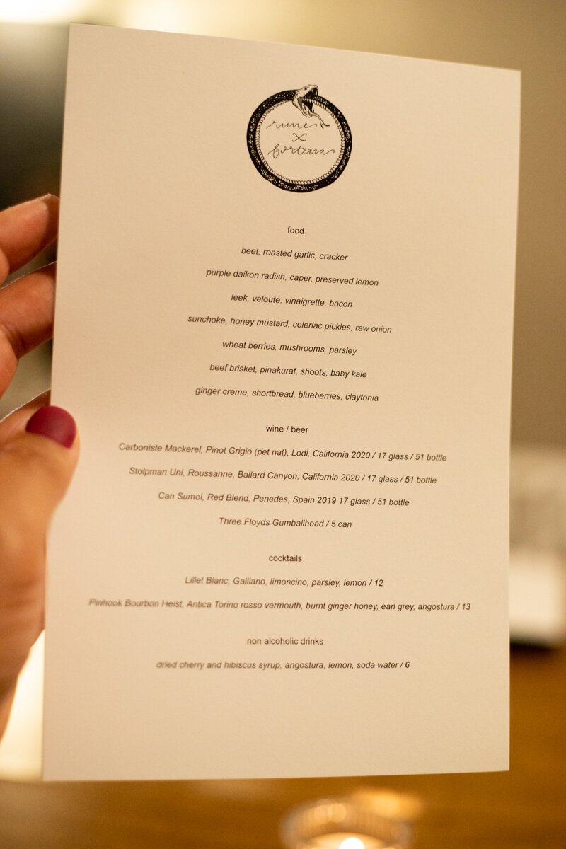 Our table is equipped with a menu describing the thoughtfully curated tasting.