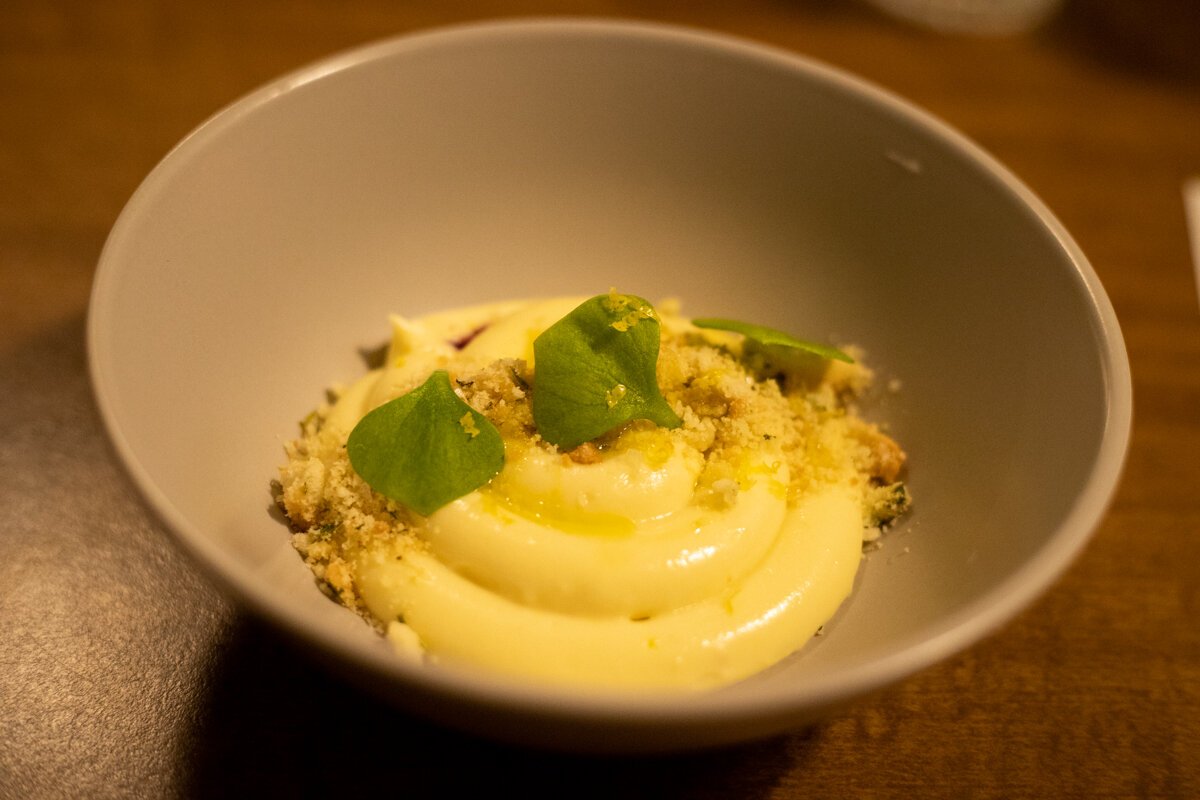 The last course features a dessert creme that’s complex with tart berries, bright ginger, a swirl of slick olive oil, a buttery shortbread crisp, and a fair amount of salt.