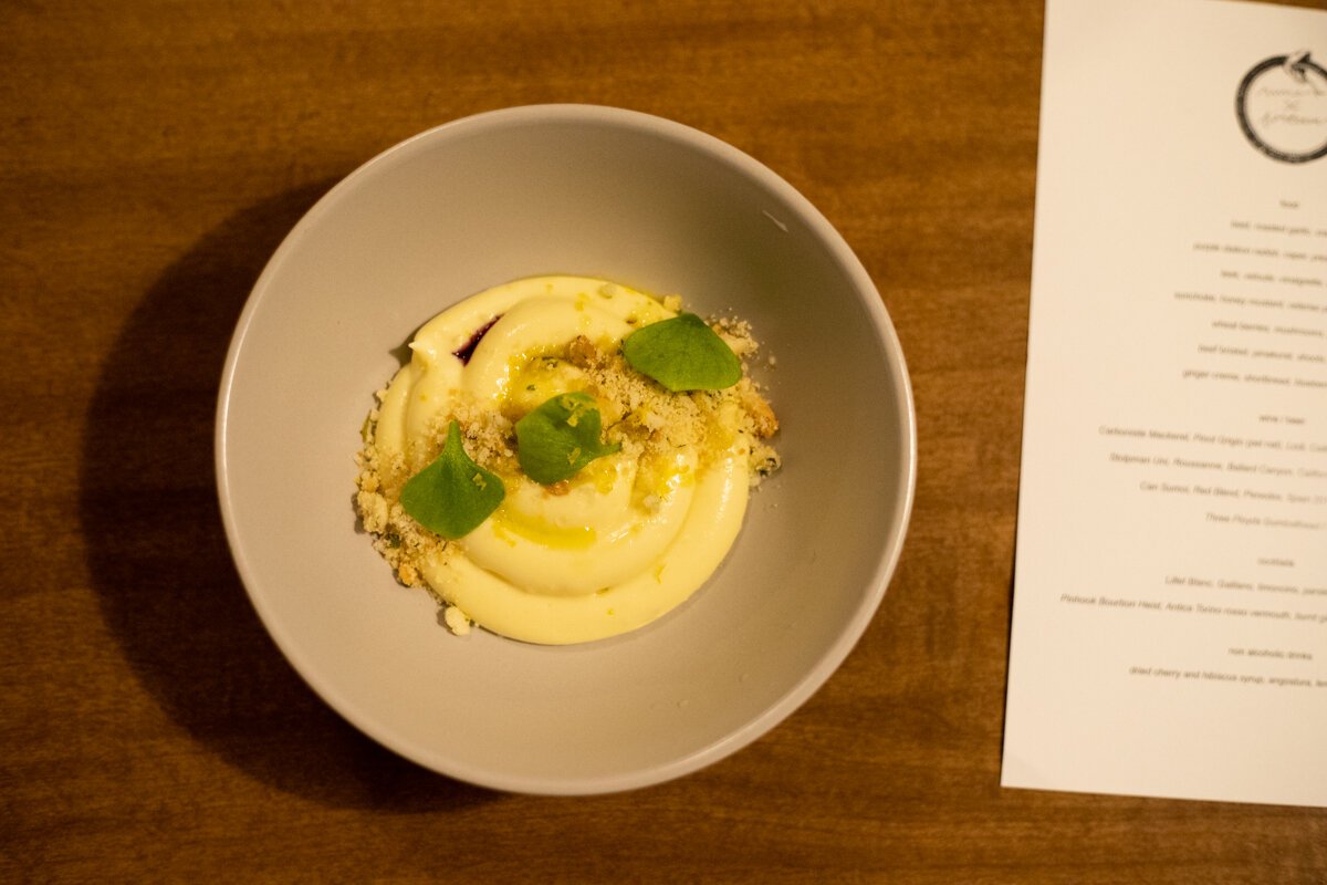 The last course features a dessert creme that’s complex with tart berries, bright ginger, a swirl of slick olive oil, a buttery shortbread crisp, and a fair amount of salt.