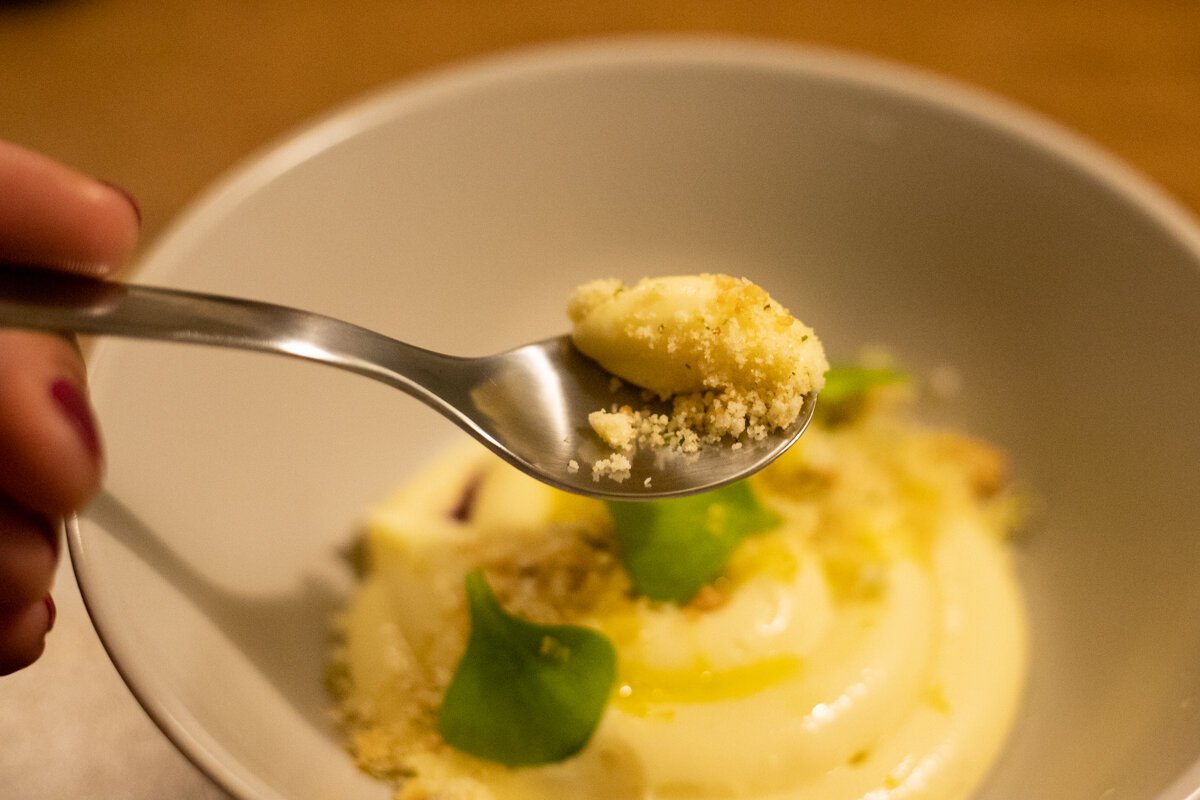 The last course features a dessert creme that’s complex with tart berries, bright ginger, a swirl of slick olive oil, a buttery shortbread crisp, and a fair amount of salt.