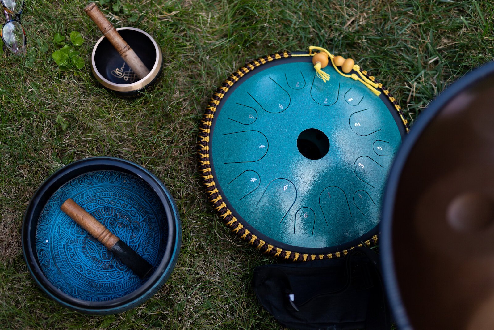 Diane Rogers uses a tongue drum and various singing bowls during the class.