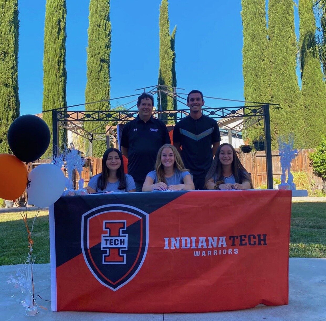 From left, back row are Indiana Tech Women's Soccer Coaches Jim Lipocky and Glen Gomez. In front of them are players Karmina Jimenez, Alyssa Williams, Alina Garcia.