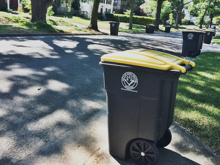 Single-stream recycling bins are picked up to be sorted at a Materials Recovery Facility (MRF).