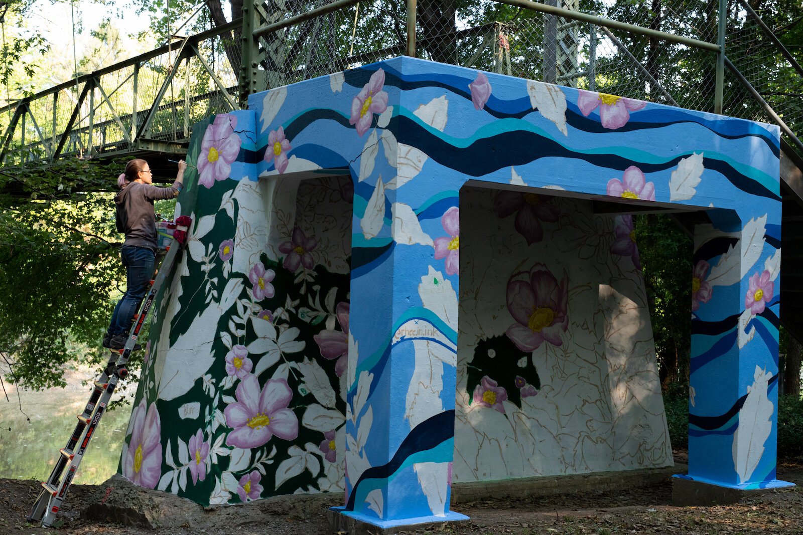 A portion of Suzanne Rhee's mural work in Foster Park.