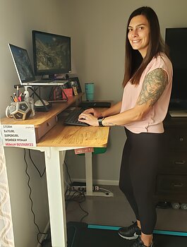 In her home office, Rhiannon uses a walking pad under her desk to help avoid sitting for long periods.