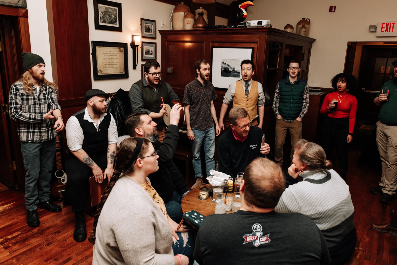 Members of the Ragtag Bunch sing during a performance at J.K. O’ Donnell’s on February 24, 2022.