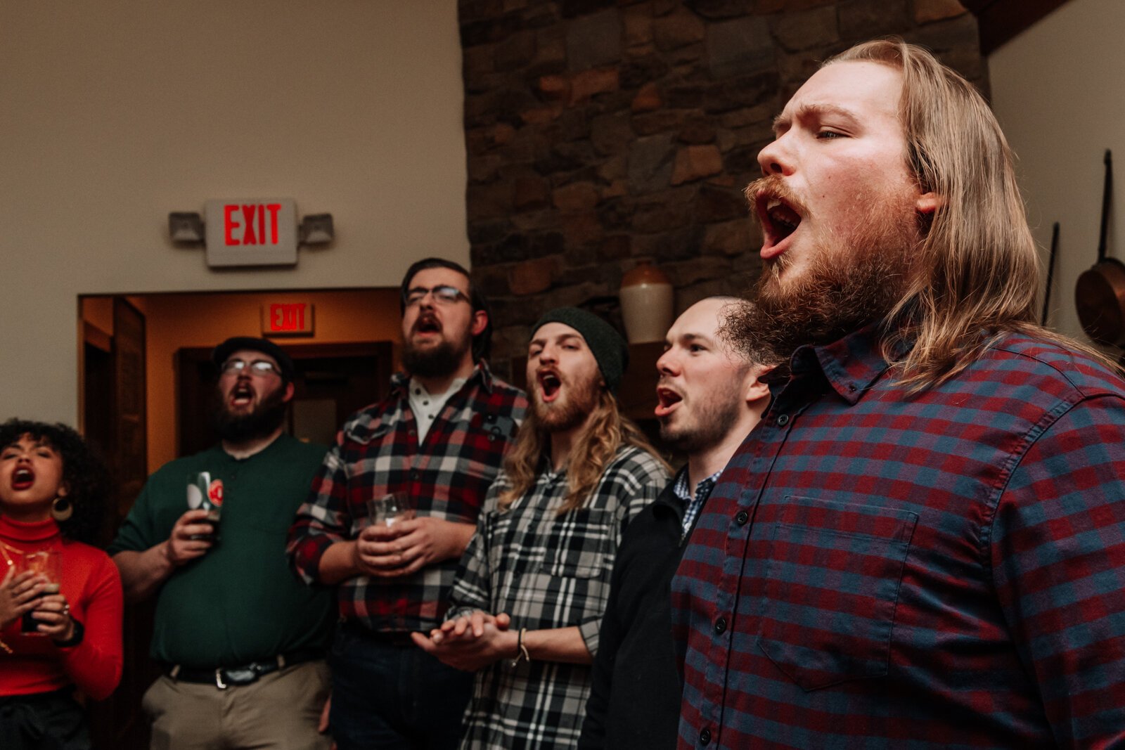 Members of the Ragtag Bunch sing during a performance at J.K. O’ Donnell’s on February 24, 2022.