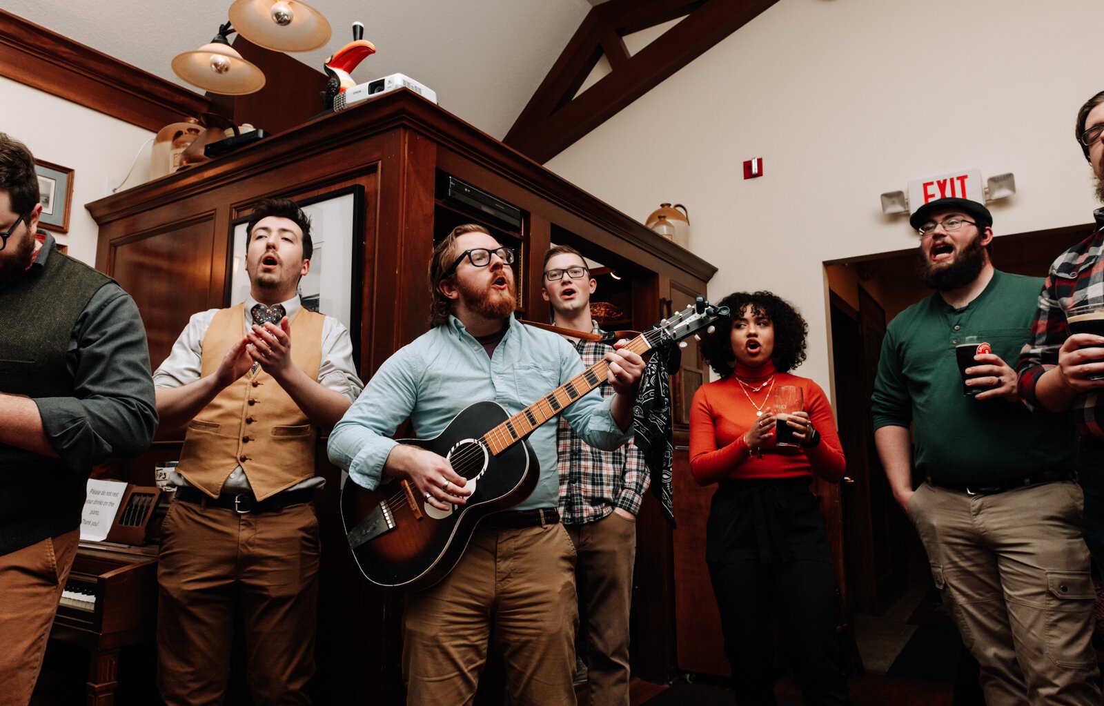 Members of the Ragtag Bunch sing during a performance at J.K. O’ Donnell’s on February 24, 2022.