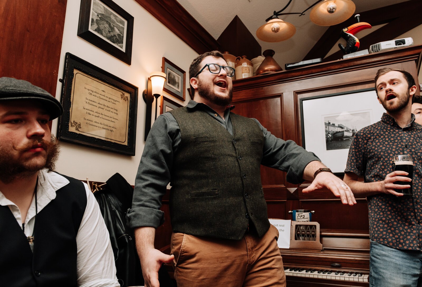 Stephen Stachofsky, center, of the Ragtag Bunch sings during a performance at J.K. O’ Donnell’s on February 24, 2022.