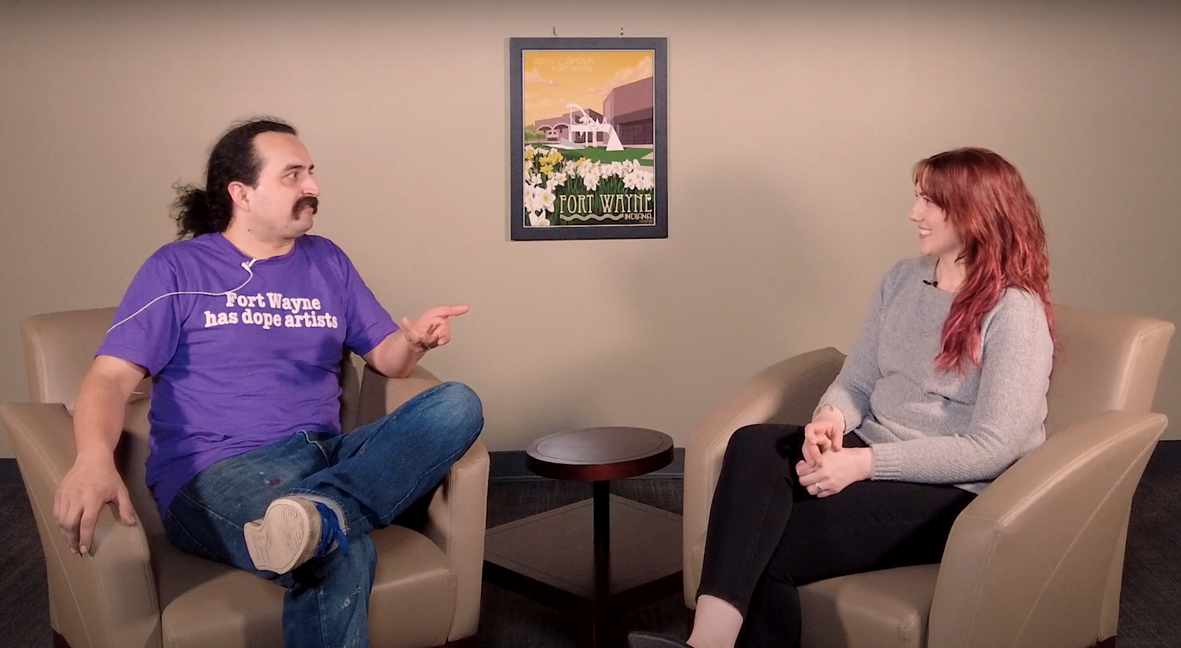 Rachelle Reinking, Director of Communications for Arts United, chats with Francisco Reyes, a local artist, about Fort Wayne Open Walls and Wrecklords events.