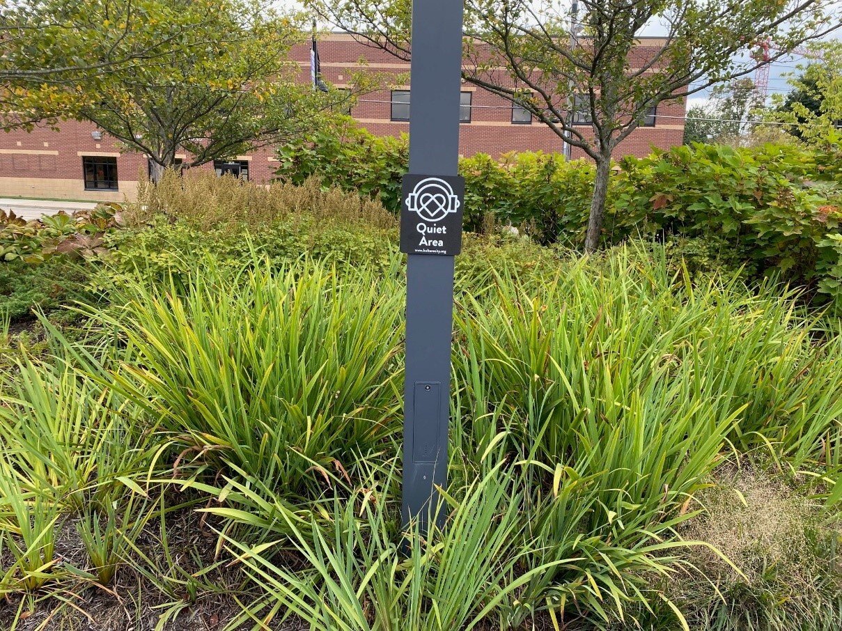 A sign at Promenade Park indicating a quiet area of the park.