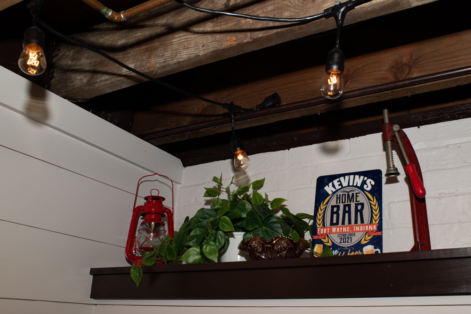 Details on the shelving behind Kevin Christon's basement bar.