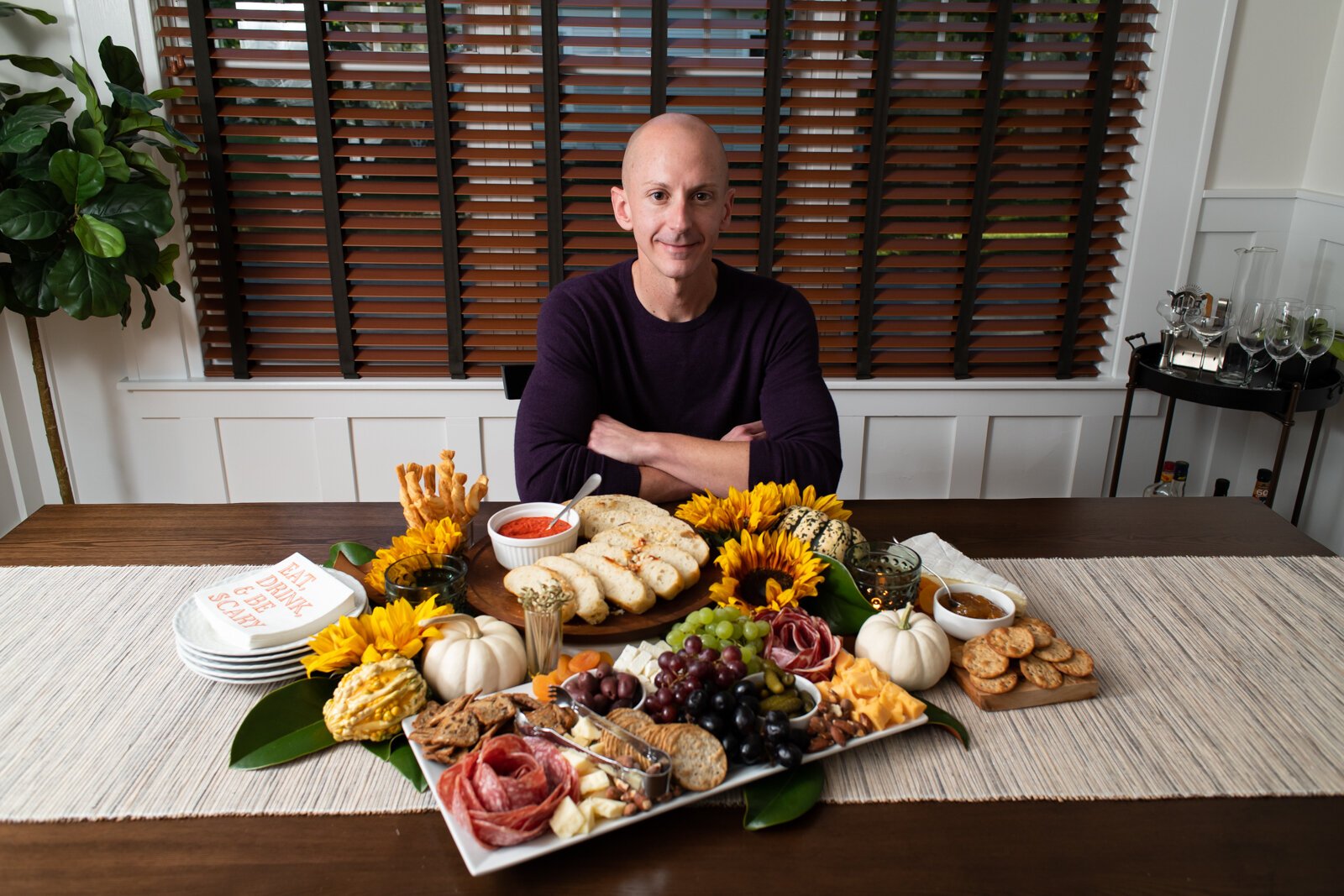 The charcuterie board set-up that Kevin Christon created for guests in the dining room of his home.