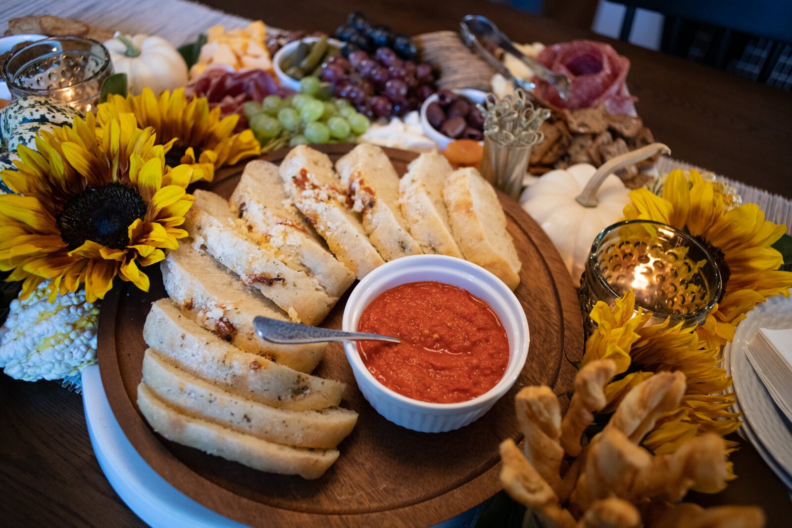 The charcuterie board set-up that Kevin Christon created for guests in the dining room of his home.