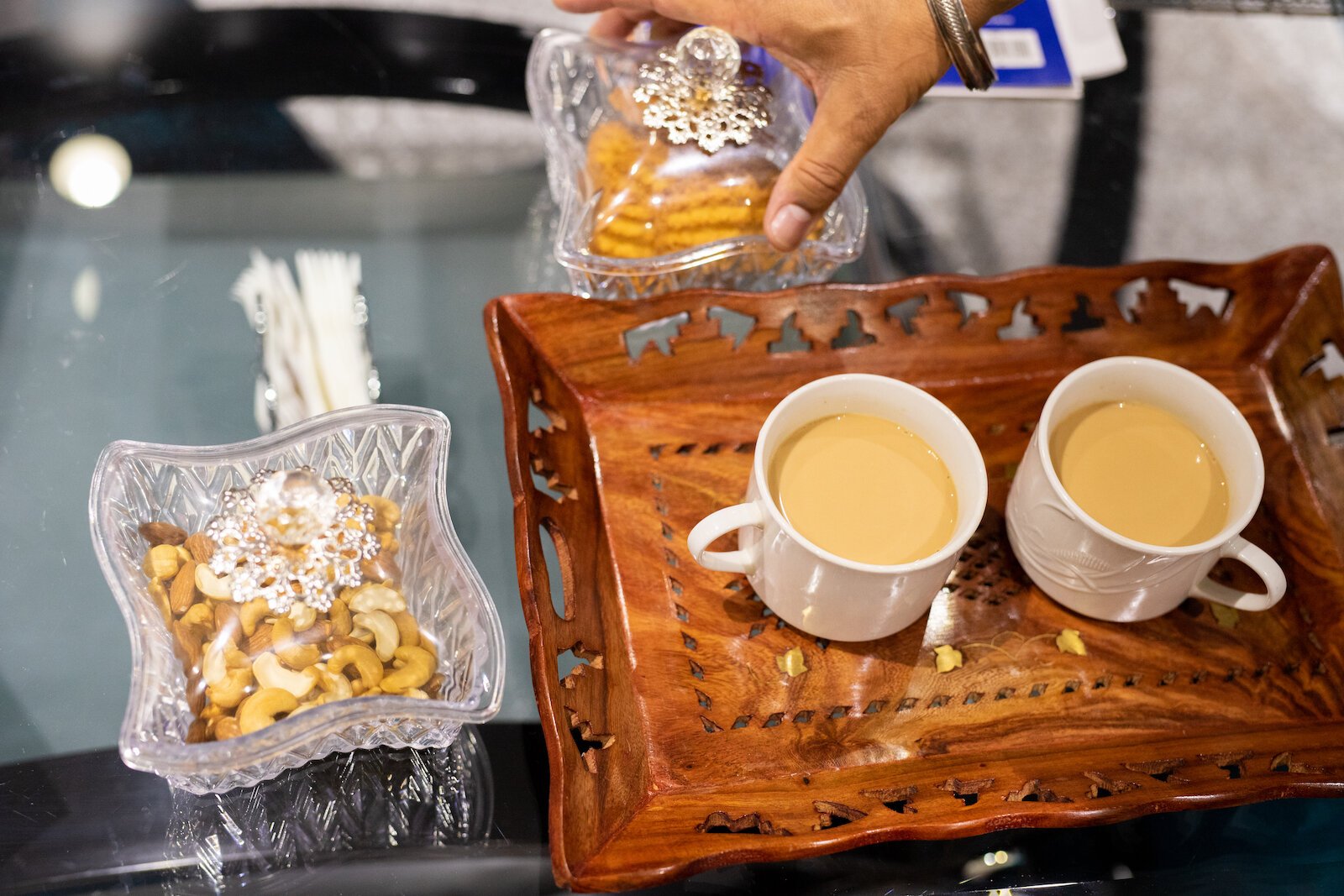 Singh makes his own chai tea for guests.