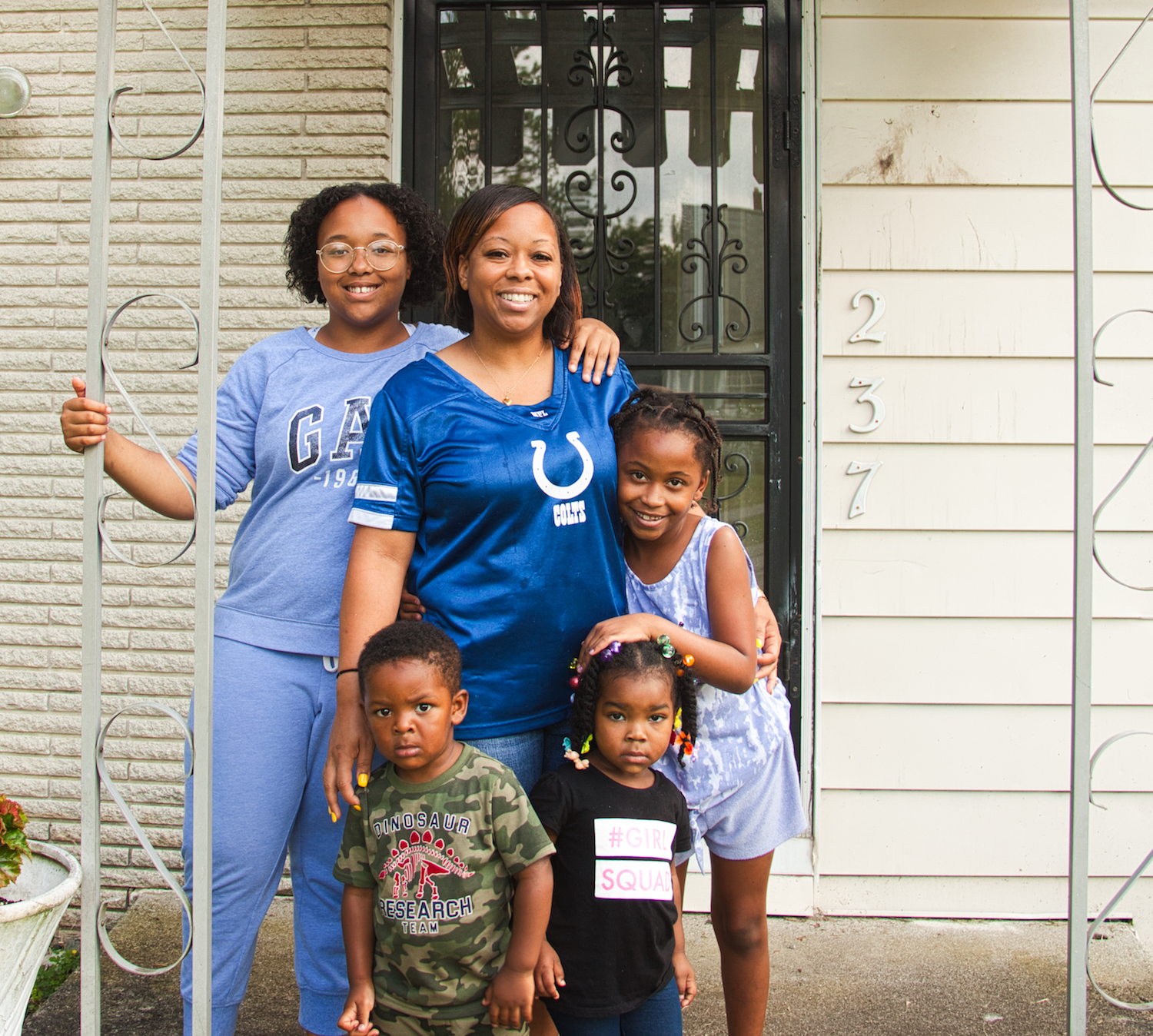 Kendra Smiley and her daughters Kendall and Kenyale as well as two of the children she cares for at her home-based daycare service.