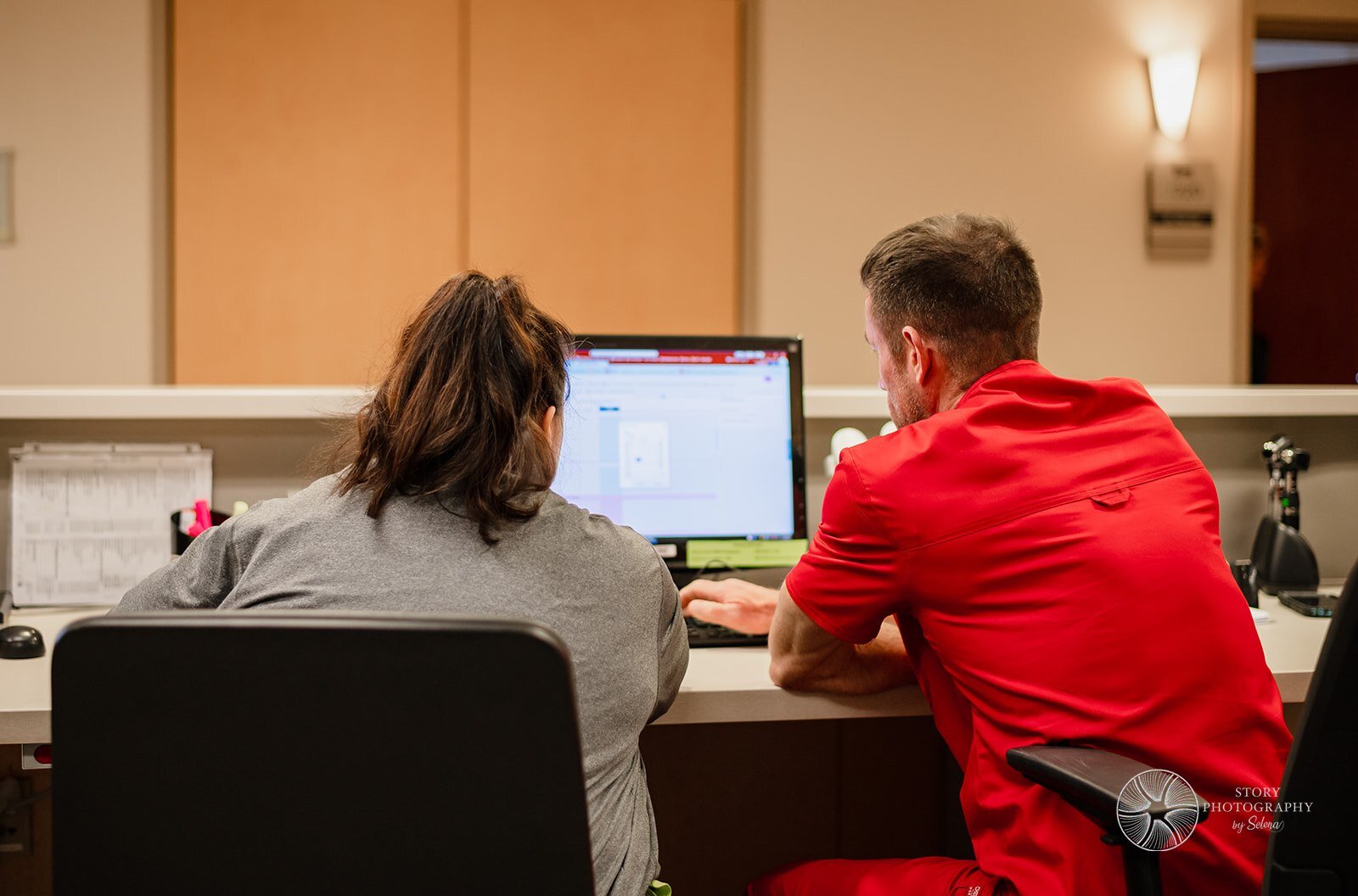 Roni Elliott, Parkview nurse and Indiana University Fort Wayne instructor, helps a student during clinical.