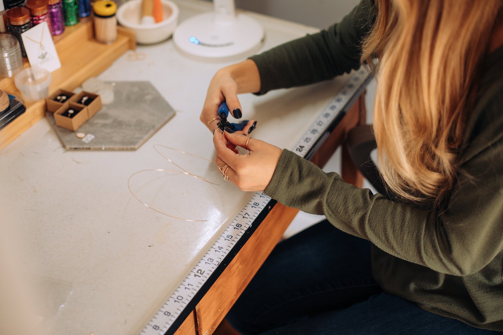 Still Remains Jewelry Owner Raelyn Bever works on a ring.