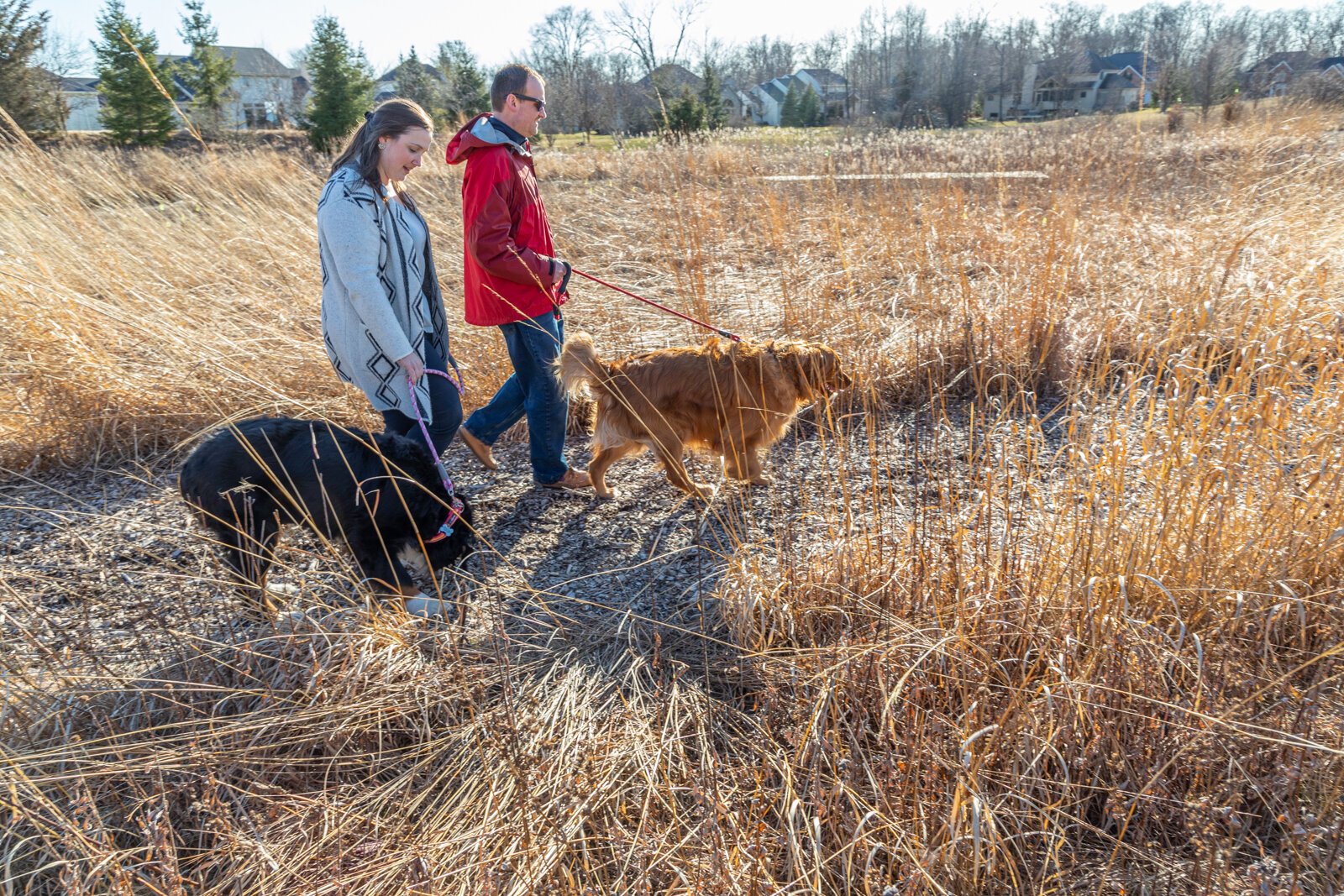 Families explore the prairie outside of Stillwater Hospice.