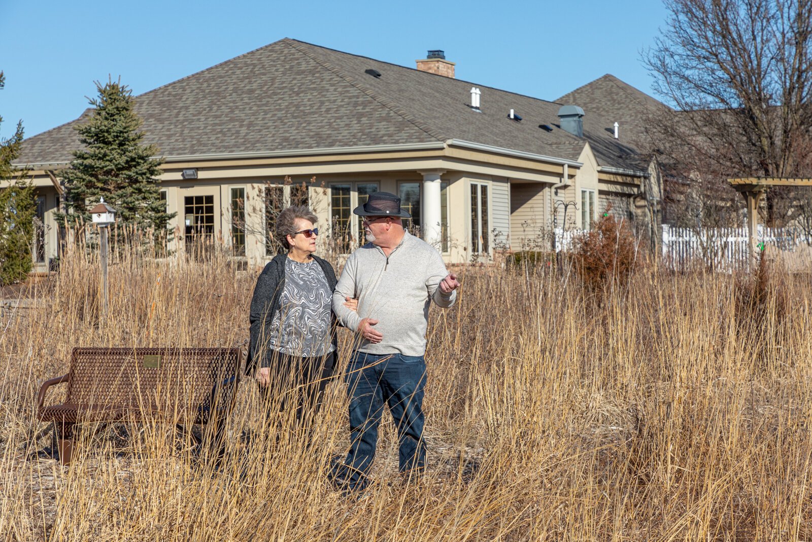 Families explore the prairie outside of Stillwater Hospice.