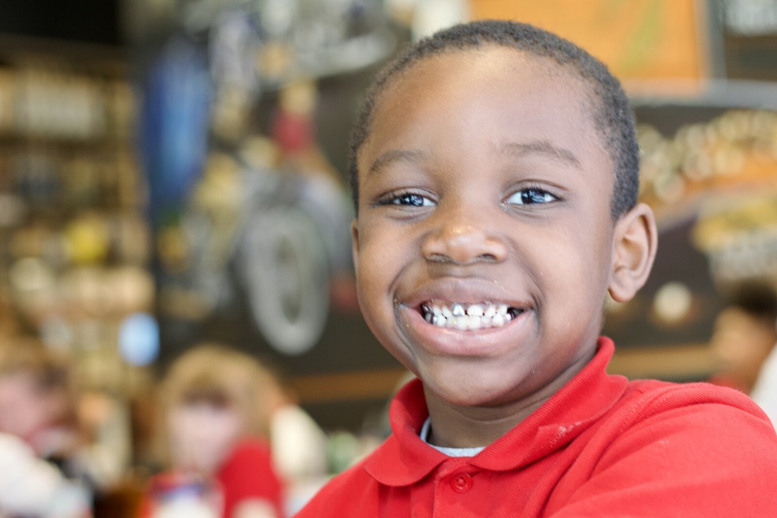 First Grade students in a Junior Achievement of Northern Indiana program attend a class trip to visit Mercado restaurant in Downtown Fort Wayne to learn from its local founder.