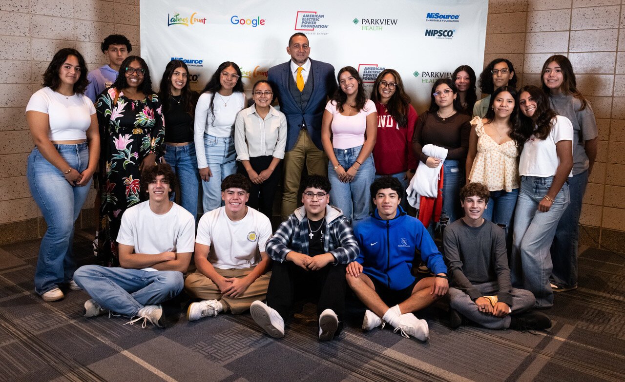 Students pose with keynote speaker Gian Paul Gonzalez at the 2024 annual scholarship event.