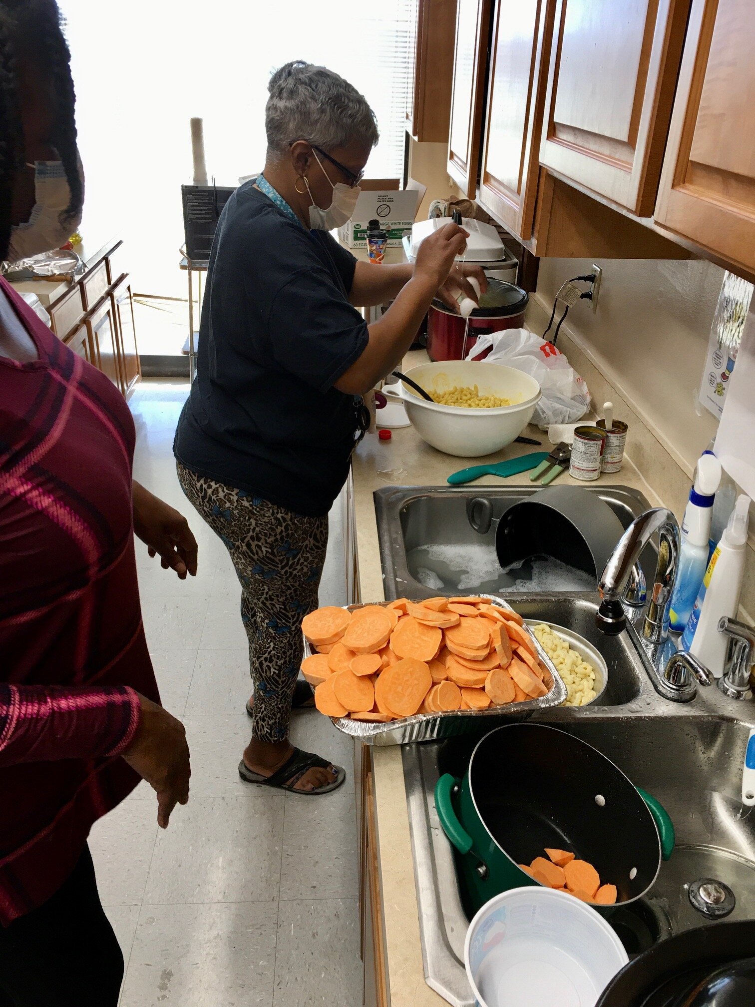 Tenant leaders at Tall Oaks Apartments give back to their fellow residents with home-cooked meals.