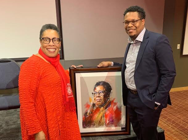 Fort Wayne artist Theoplis Smith III, the owner of Phresh Laundry, right, poses with Ohio Congresswoman Marcia Fudge.