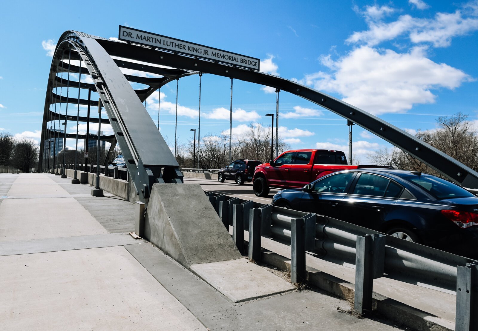 Cars pass over the Martin Luther King, Jr. Memorial Bridge.