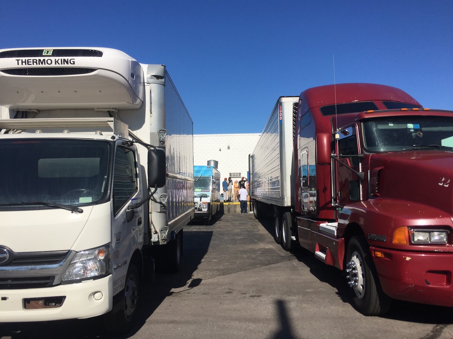 Weekly food shipments arrive by semi-truck.