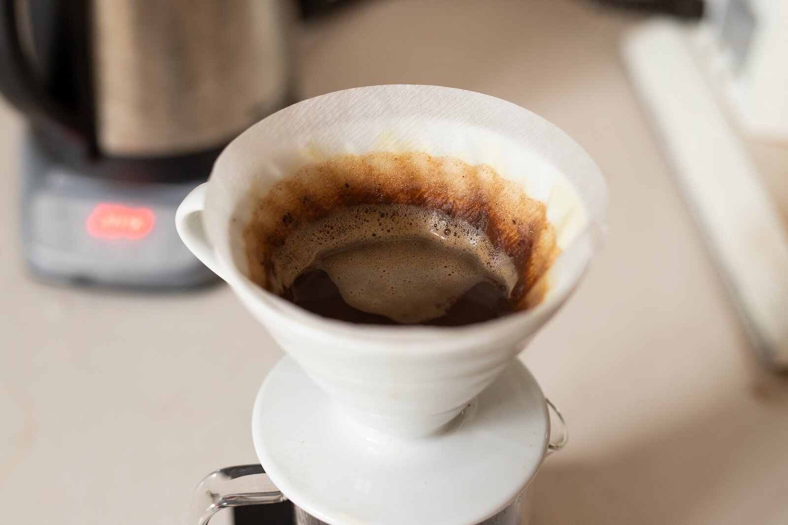 A pour over coffee involves manually pouring hot water through coffee grounds in a filter.