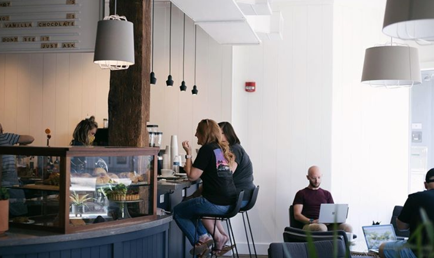 The new Utopian Coffee + Kitchen opened at 118 W. Columbia St. on Monday next door to the soon-to-be-open Landing Beer Co.