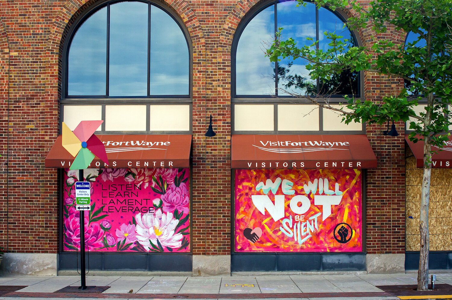 Murals on the side of Visit Fort Wayne in downtown Fort Wayne.