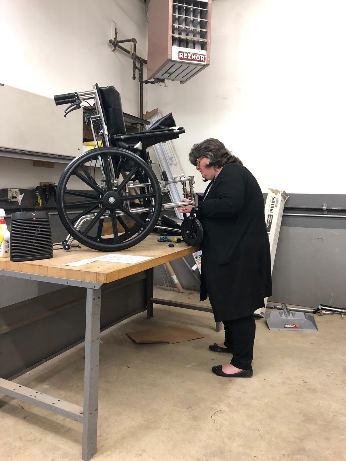 Volunteers pledge their time to refurbish wheelchairs to ship overseas.