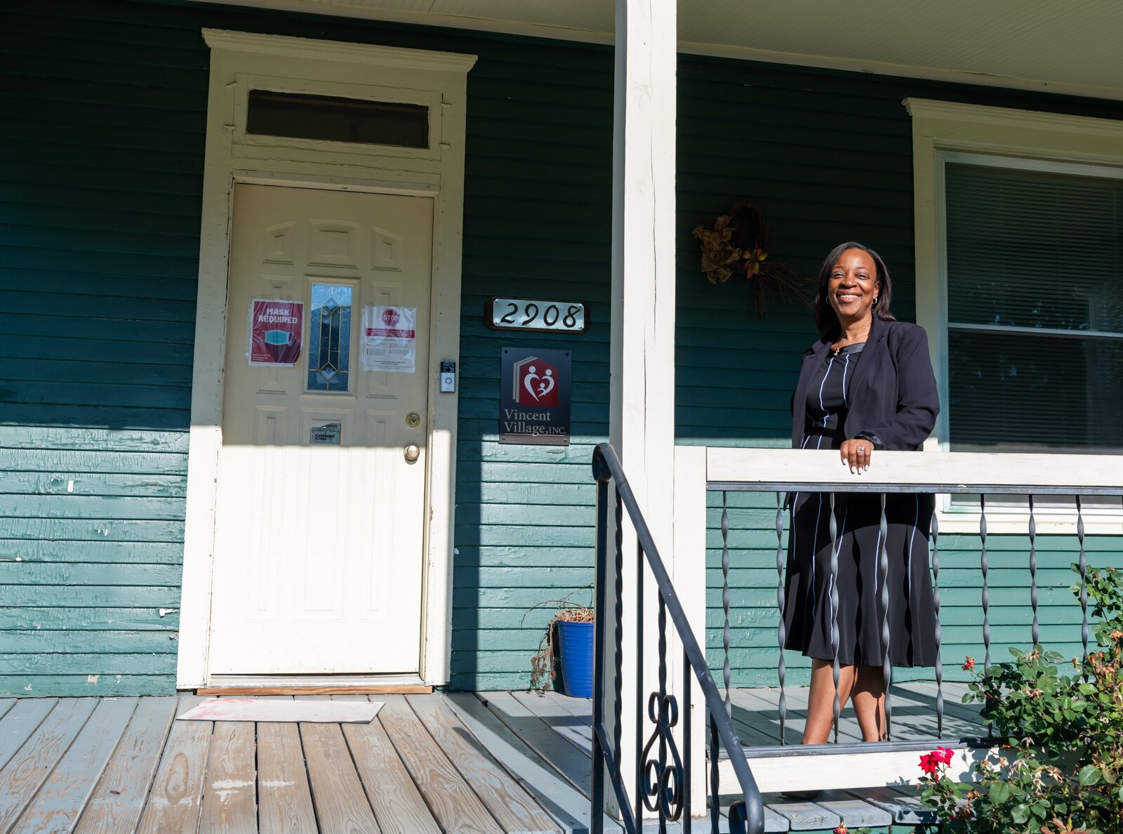 Sharon Tucker, Executive Director of Vincent Village, in front of the building used for COVID-19 relief.