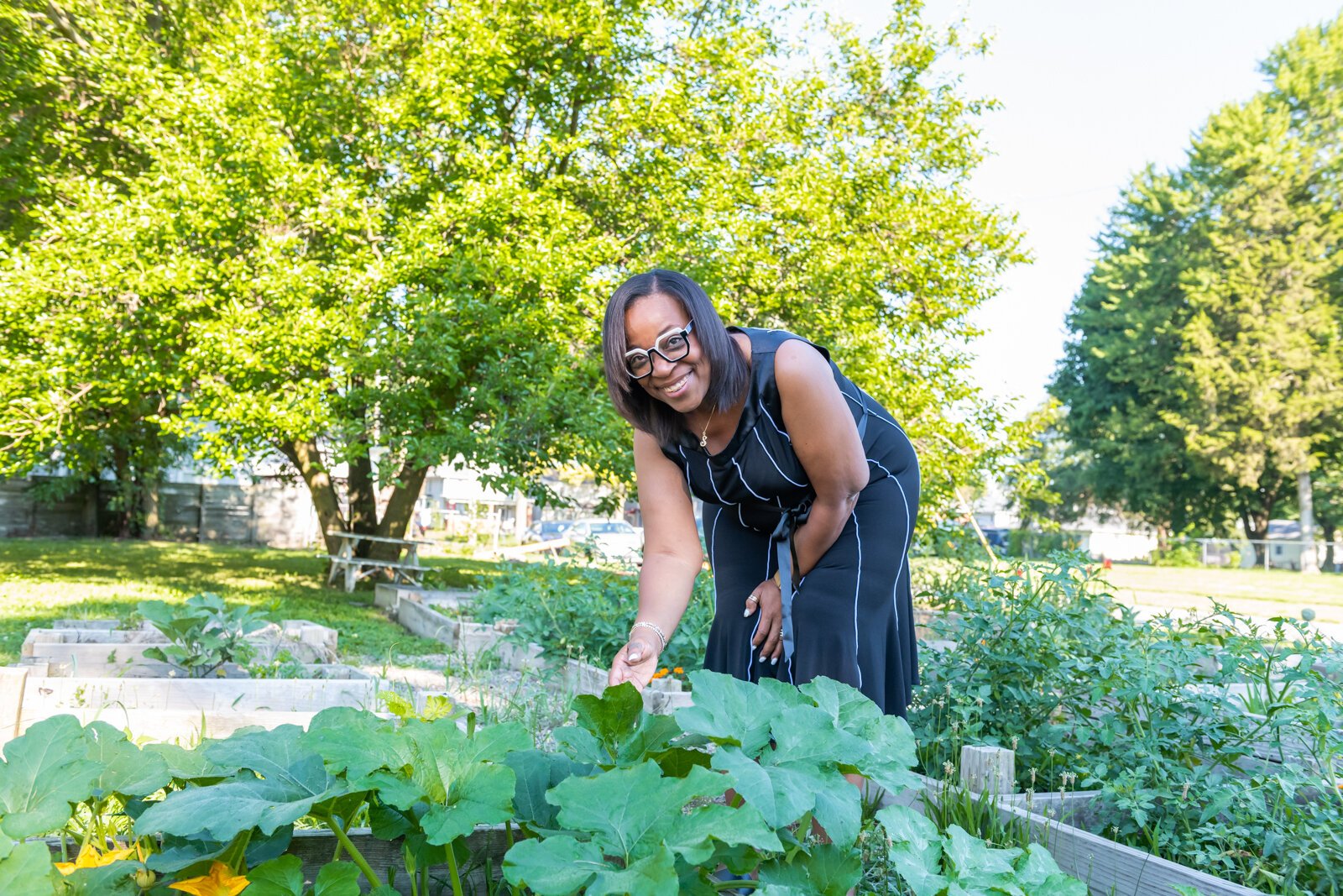 Sharon Tucker, Executive Director of Vincent Village, shows off the community garden.
