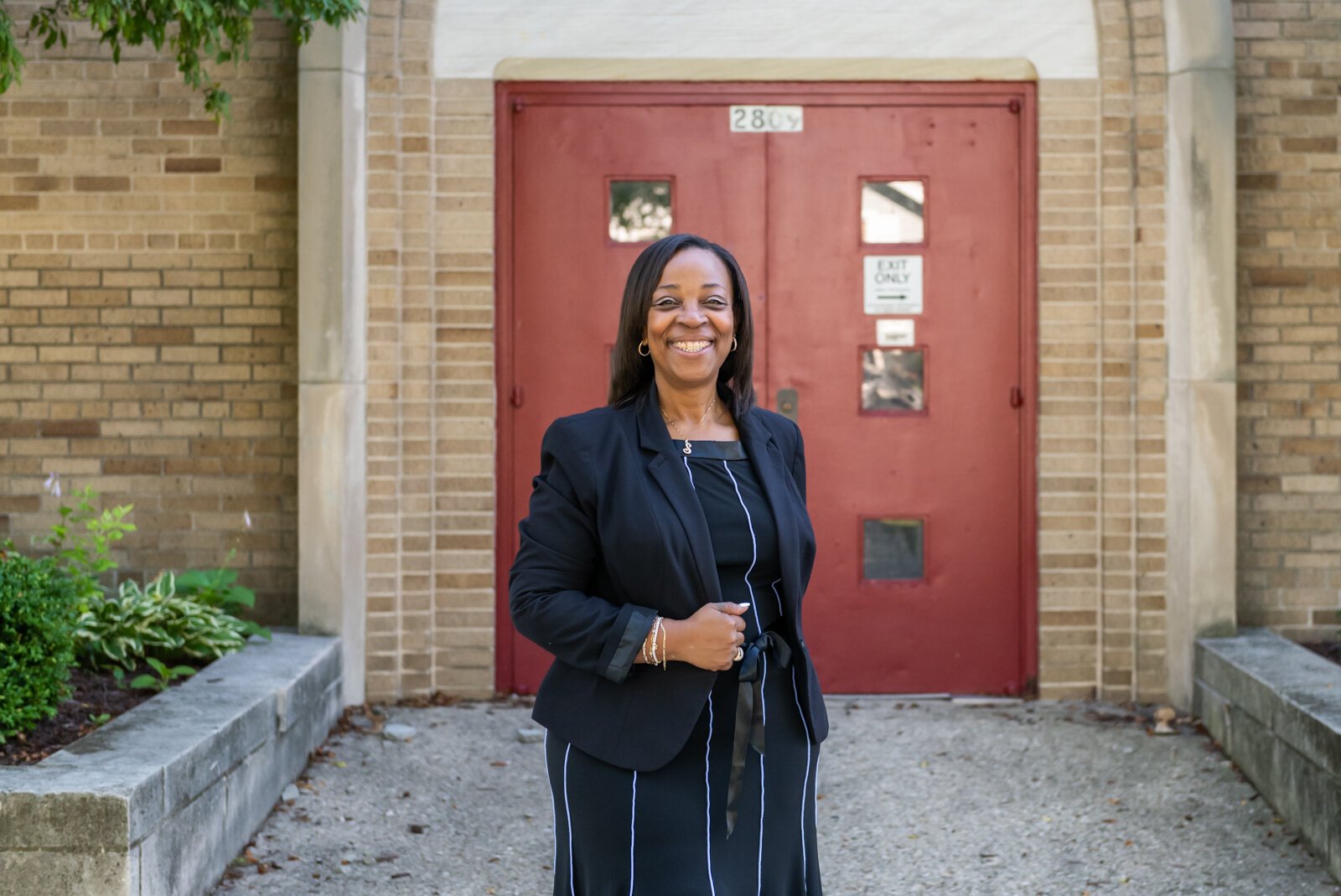 Sharon Tucker, Executive Director of Vincent Village, in front of the church - which has been converted to offices and conference rooms.