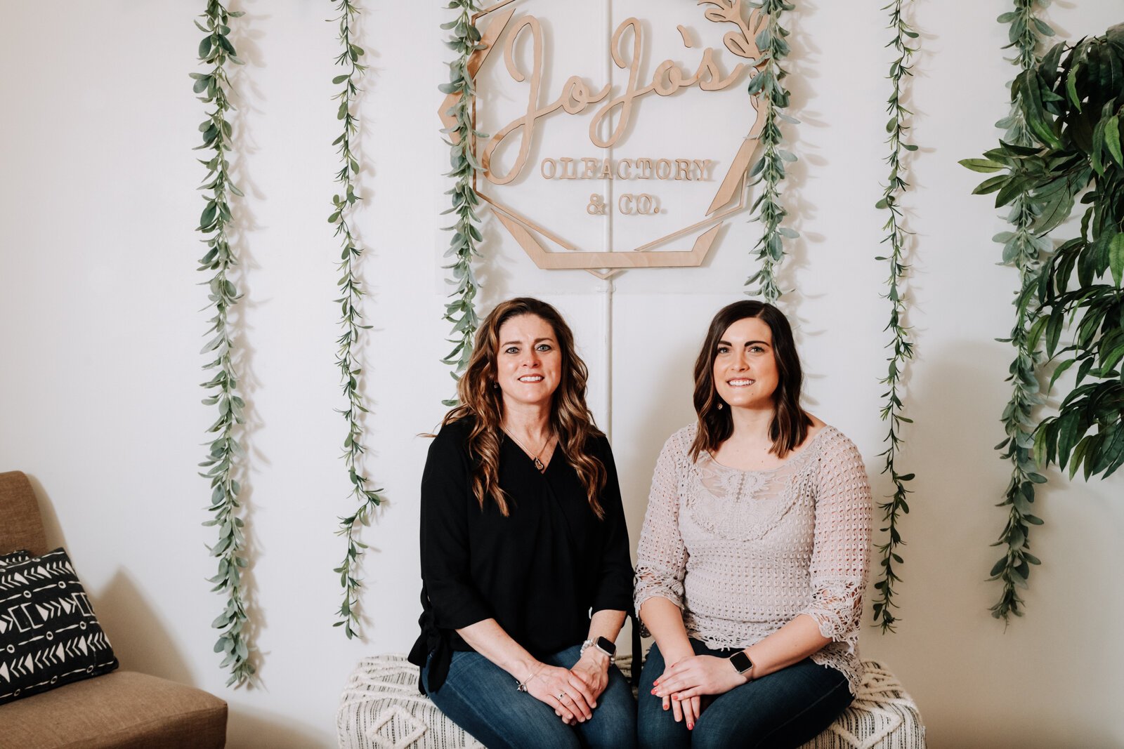 Portrait of Holly Ward, left, and daughter Abby Ward owners of JoJo's OlFactory Co.