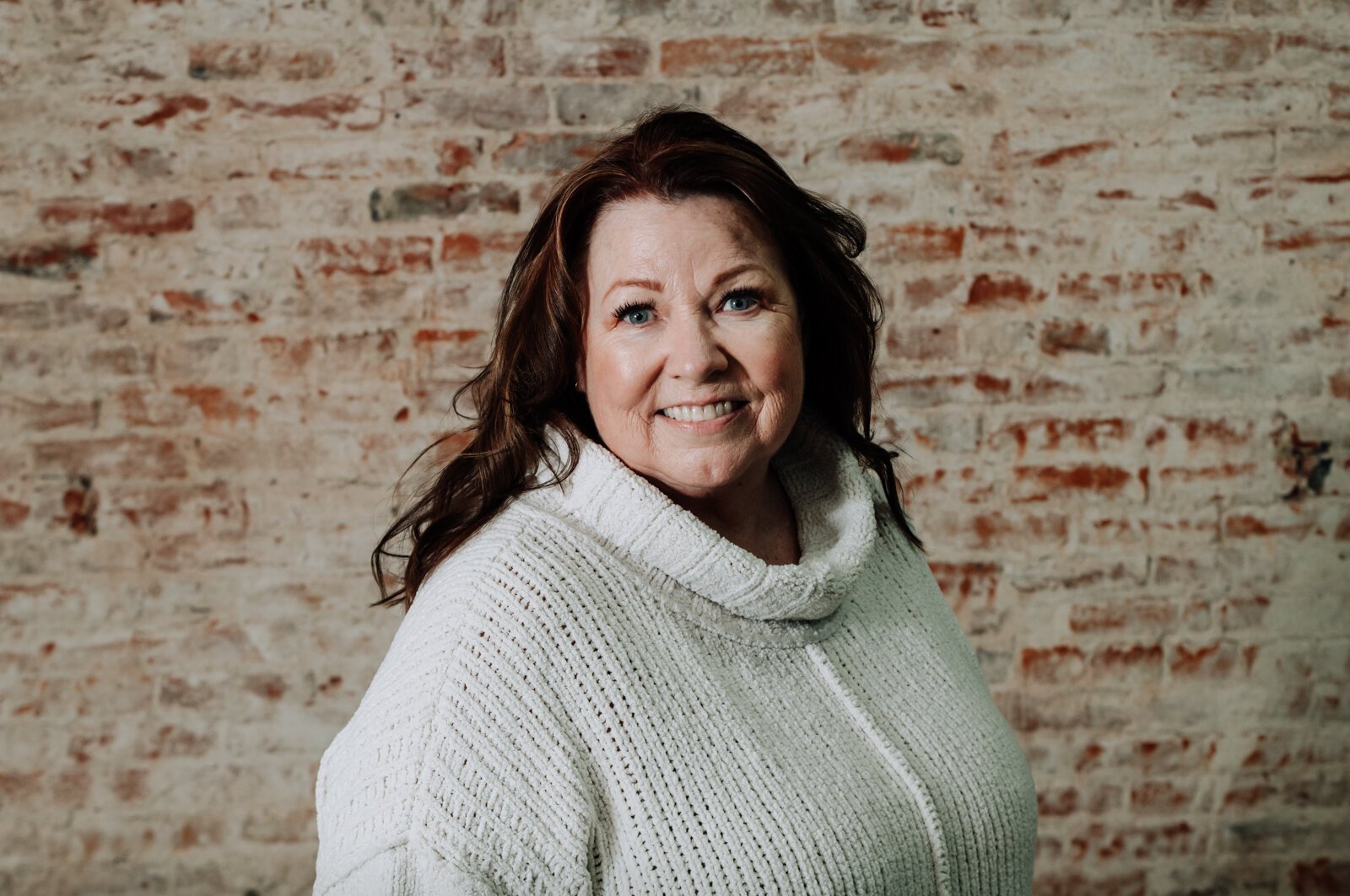 Headshot of Julie Dickey, owner, at the future location of 4Partners in Crime, Inc. an art space for food & spirit at 14 W Canal St. Wabash, IN on January 15, 2022.