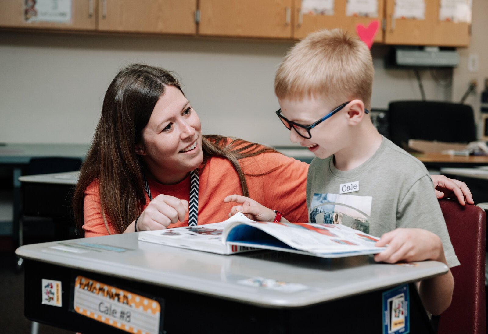 Teacher Stacey Fry helps student Cale Lundquist during reading time in her class at O J Neighbours Elementary School in Wabash.