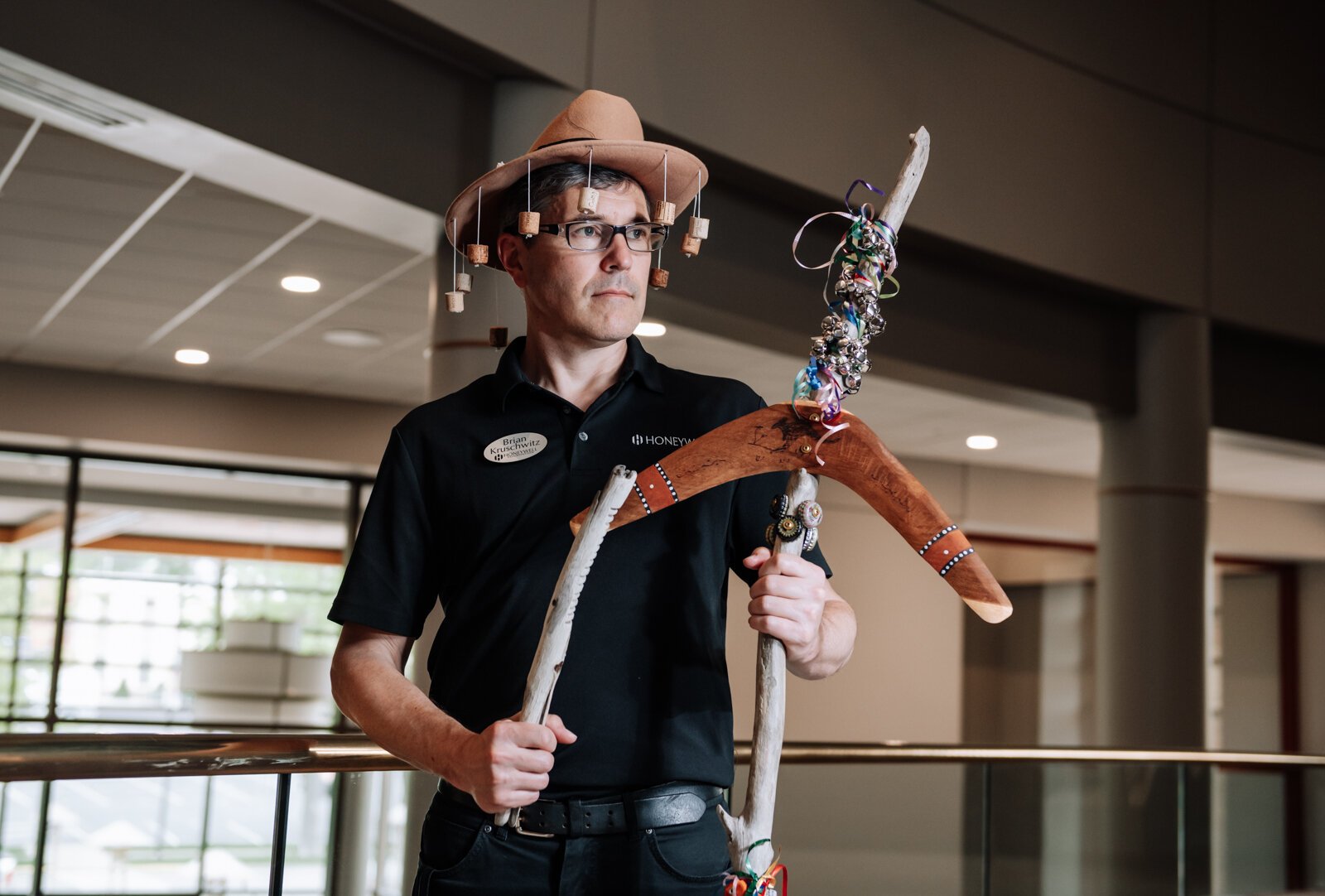 Brian Kruschwitz, Education Artistic Manager at Honeywell Foundation shows off some of the items he uses for storytelling. This includes an Australian lager phone and a hat that helps swat away flies at the Honeywell Center.