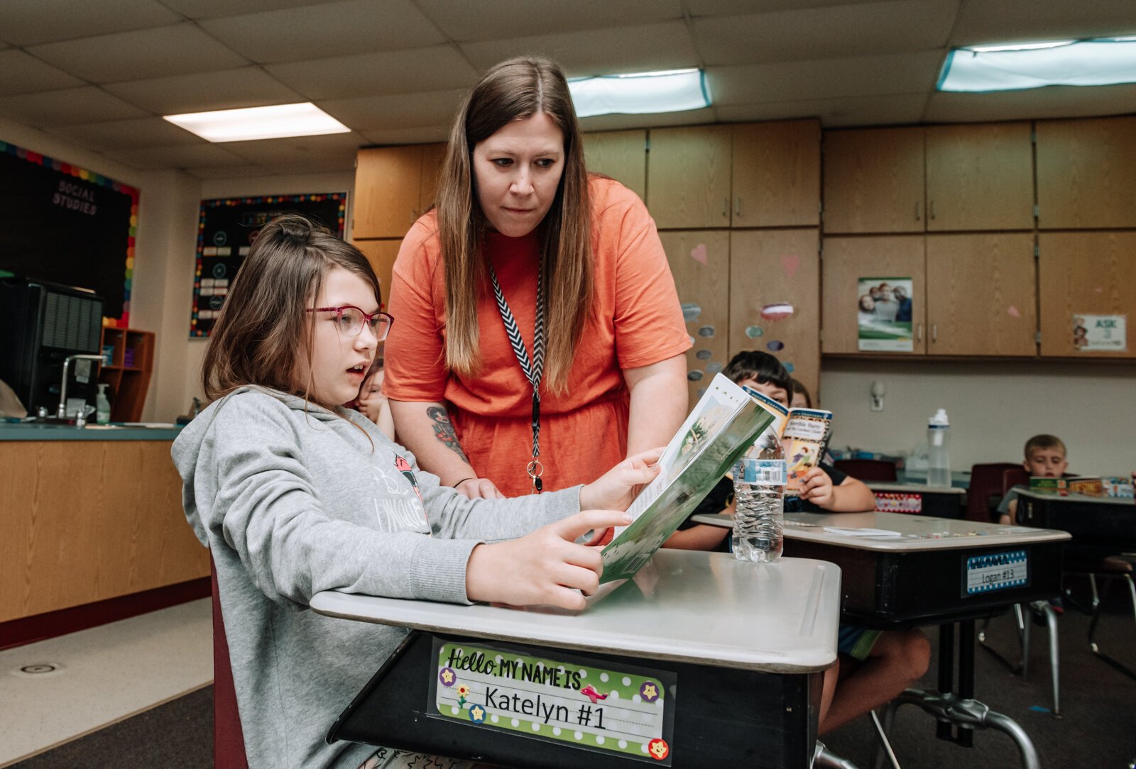 Teacher Stacey Fry helps student Katelyn Alspach during reading time in her class at O J Neighbours Elementary School in Wabash.