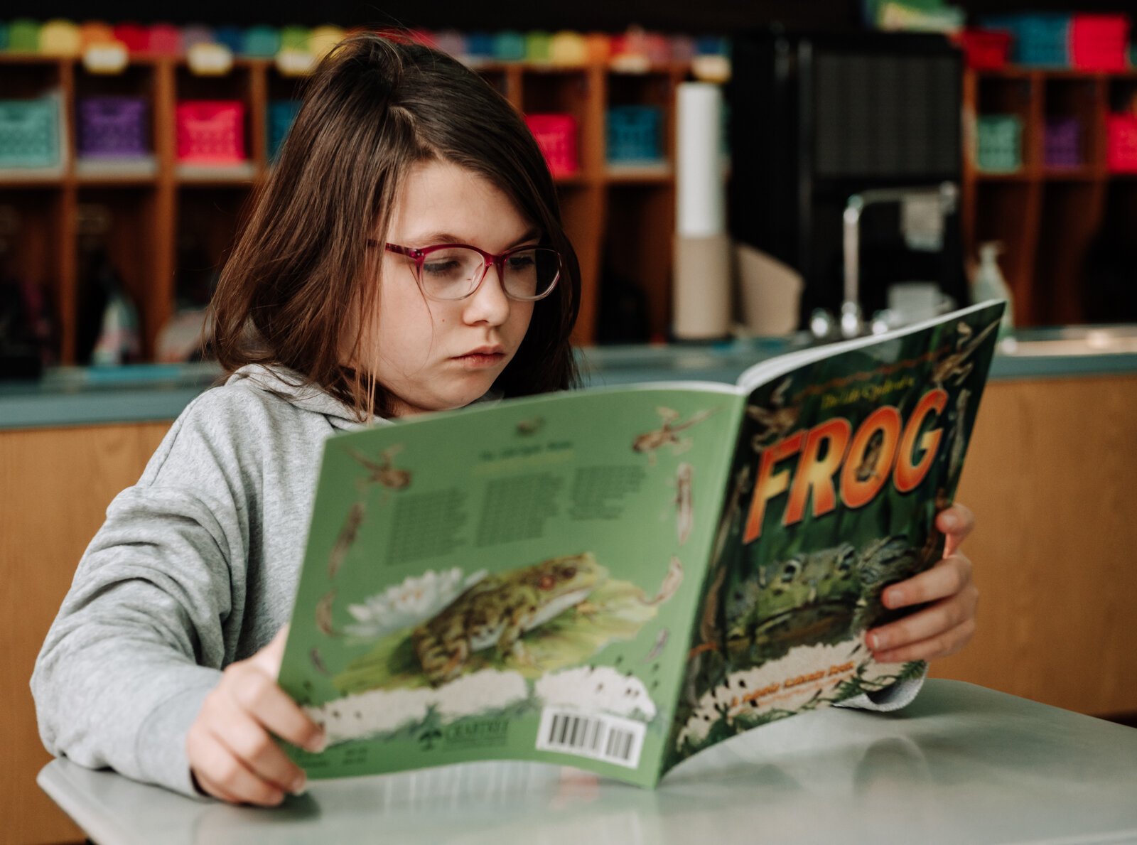 Katelyn Alspach reads during reading time in teacher Stacey Fry's class at O J Neighbours Elementary School in Wabash.