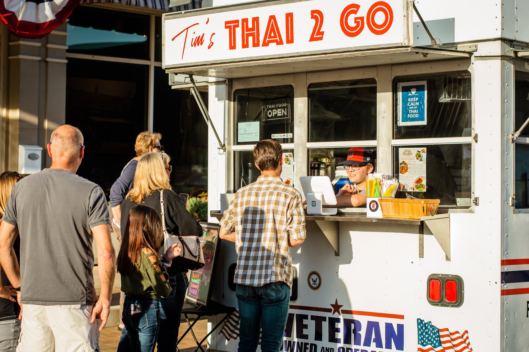 Visitors enjoy food trucks at First Fridays in Downtown Wabash.